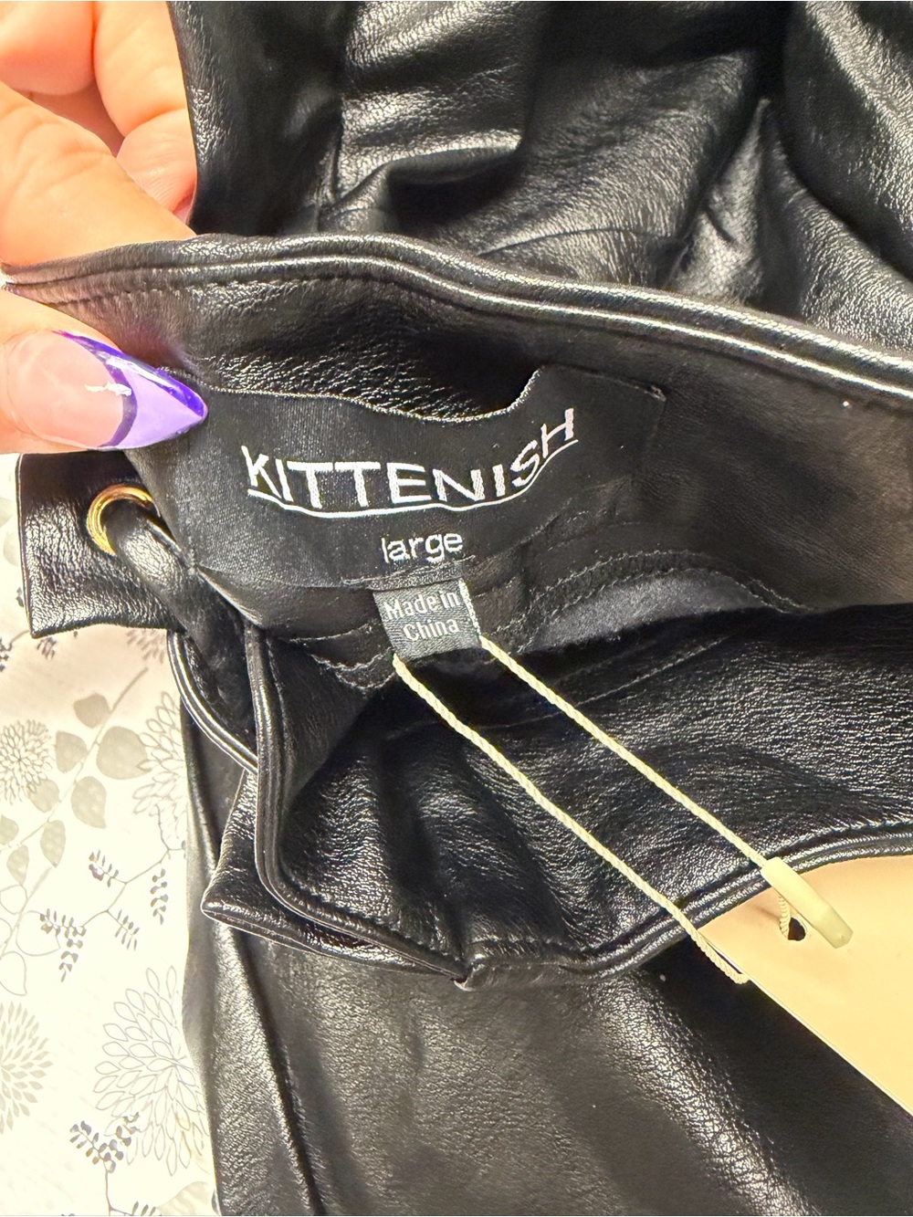Kittenish Black Faux Leather Jacket with Gold Eyelet Detail